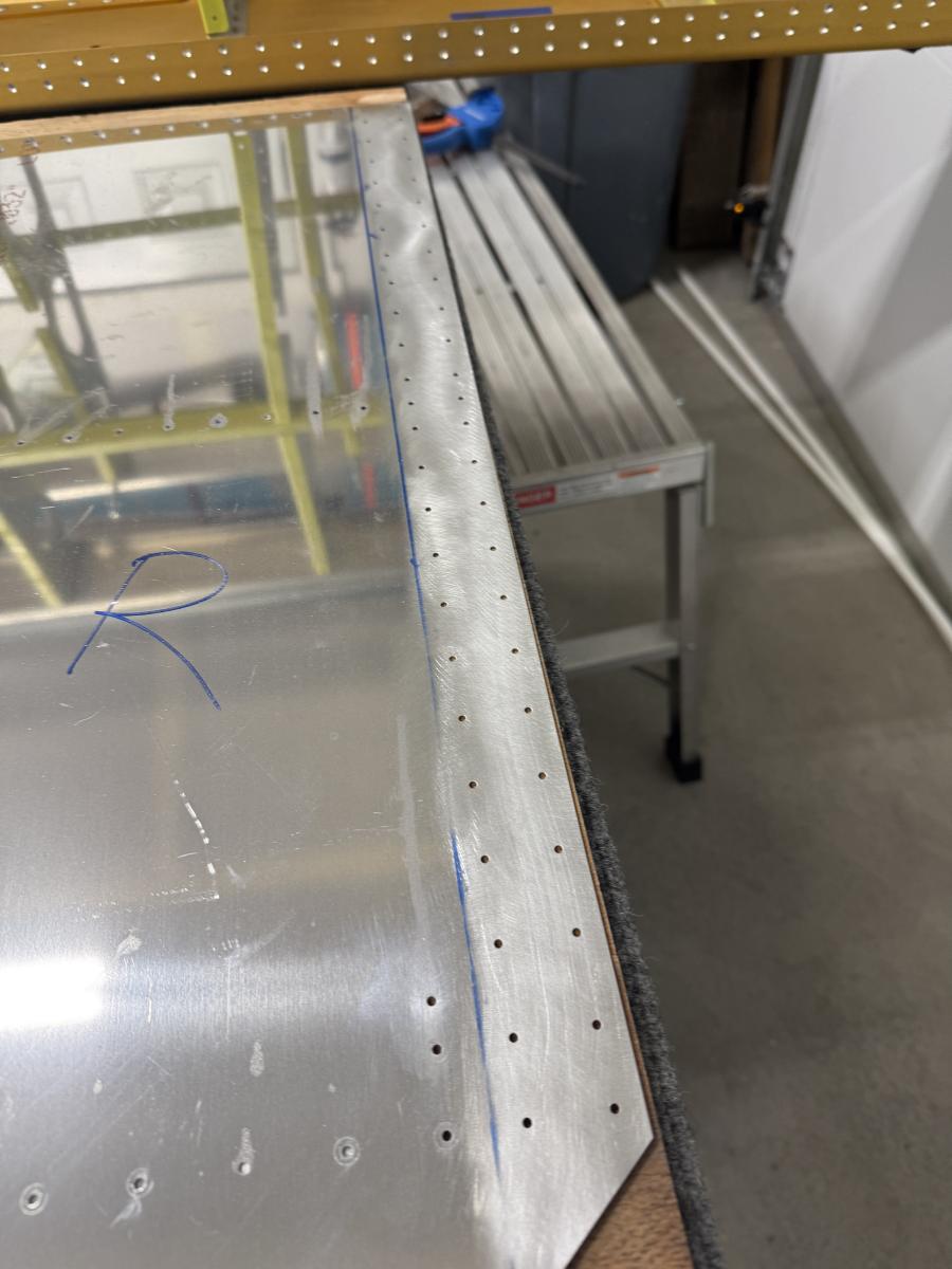 Wing skins removed for deburring