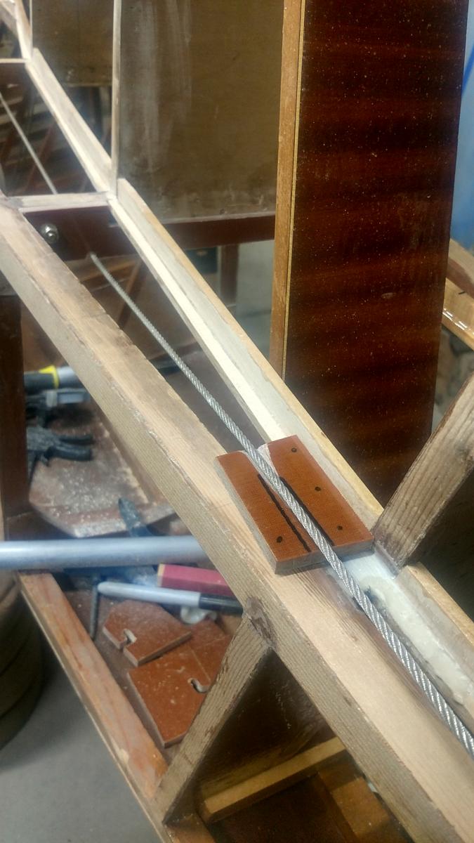 Fuselage rudder cable path